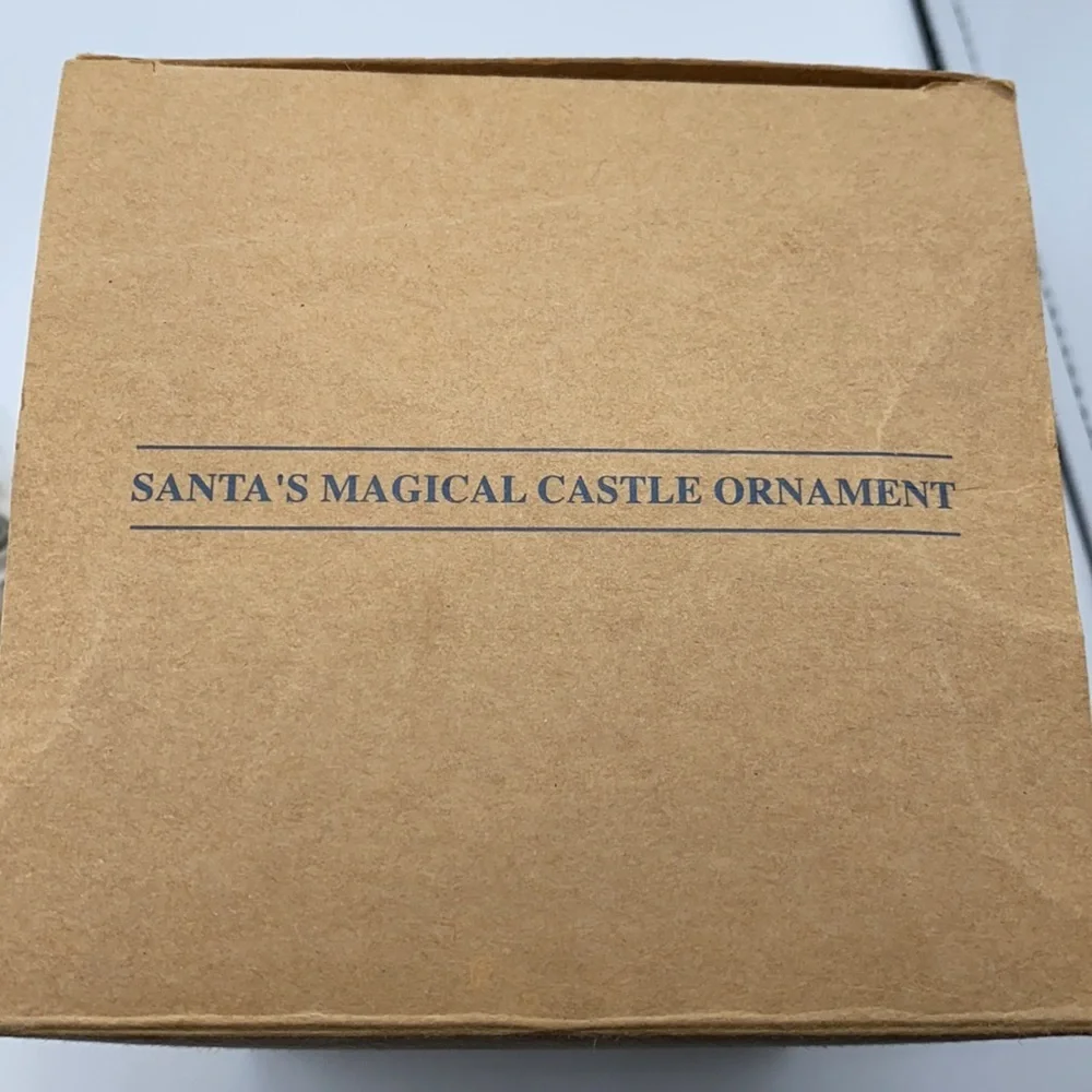 Avon Santa’s Magical Castle Vintage Ornament 1997 light and Motion
